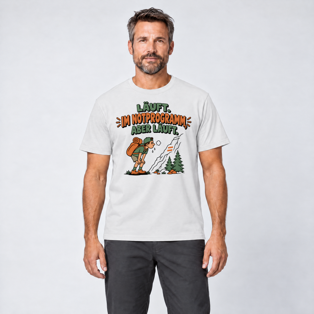 Mann trägt Im Notprogramm, aber läuft – T-Shirt Unisex in Weiß, Ansicht von vorn