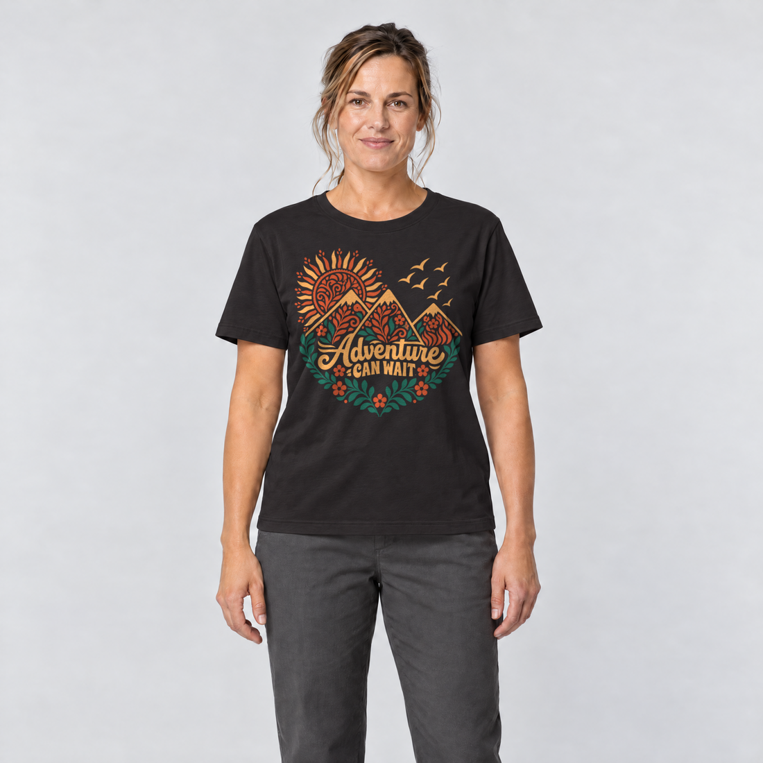 Frau trägt Adventure can wait – T-Shirt Unisex in Schwarz, Ansicht von vorn