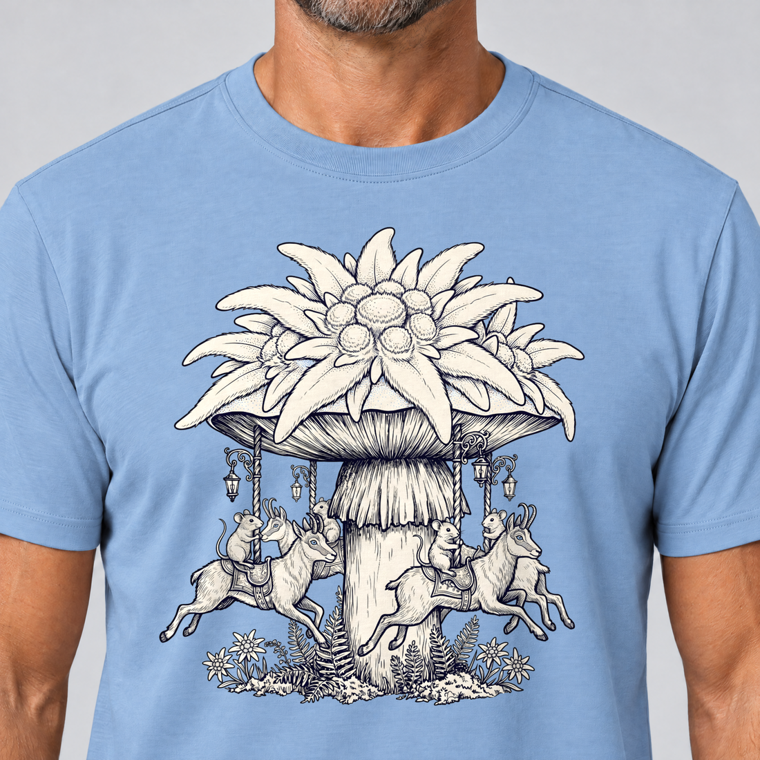 Nahaufnahme des Drucks: Edelweiß-Karussell – T-Shirt Unisex in Himmelblau, von einem Mann getragen