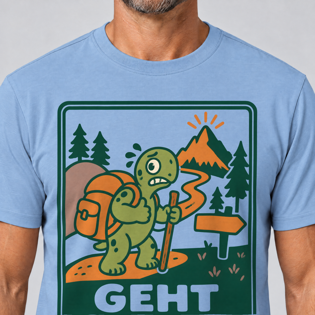 Nahaufnahme des Drucks: Geht schon – T-Shirt Unisex in Himmelblau, von einem Mann getragen