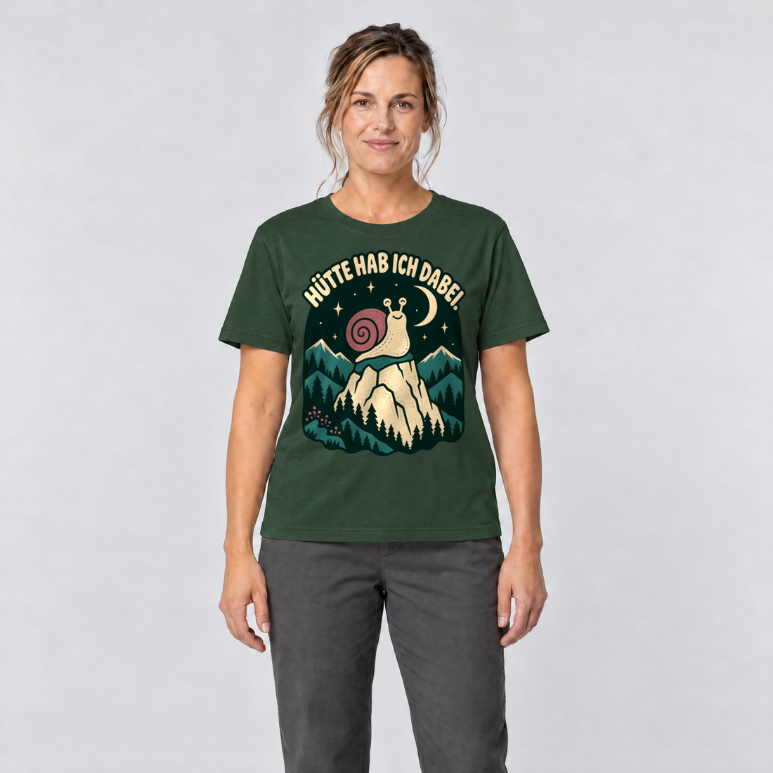 Frau trägt Hütte hab ich dabei – T-Shirt Unisex in Flaschengrün, Ansicht von vorn