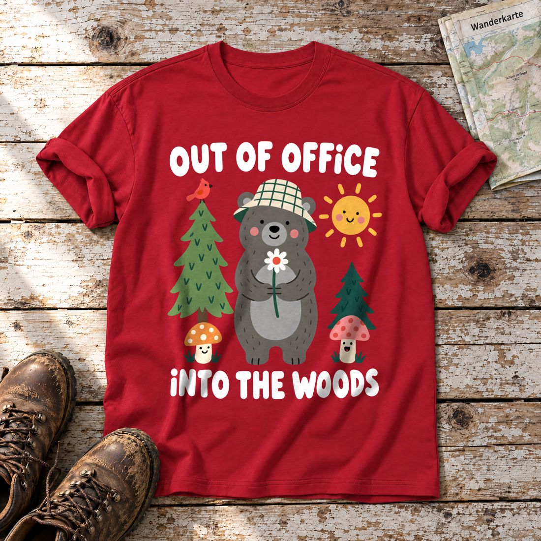 Out of Office – into the Woods – T-Shirt Unisex in Rot, flach liegend auf alten Holzbrettern mit Wanderschuhen und Wanderkarte.