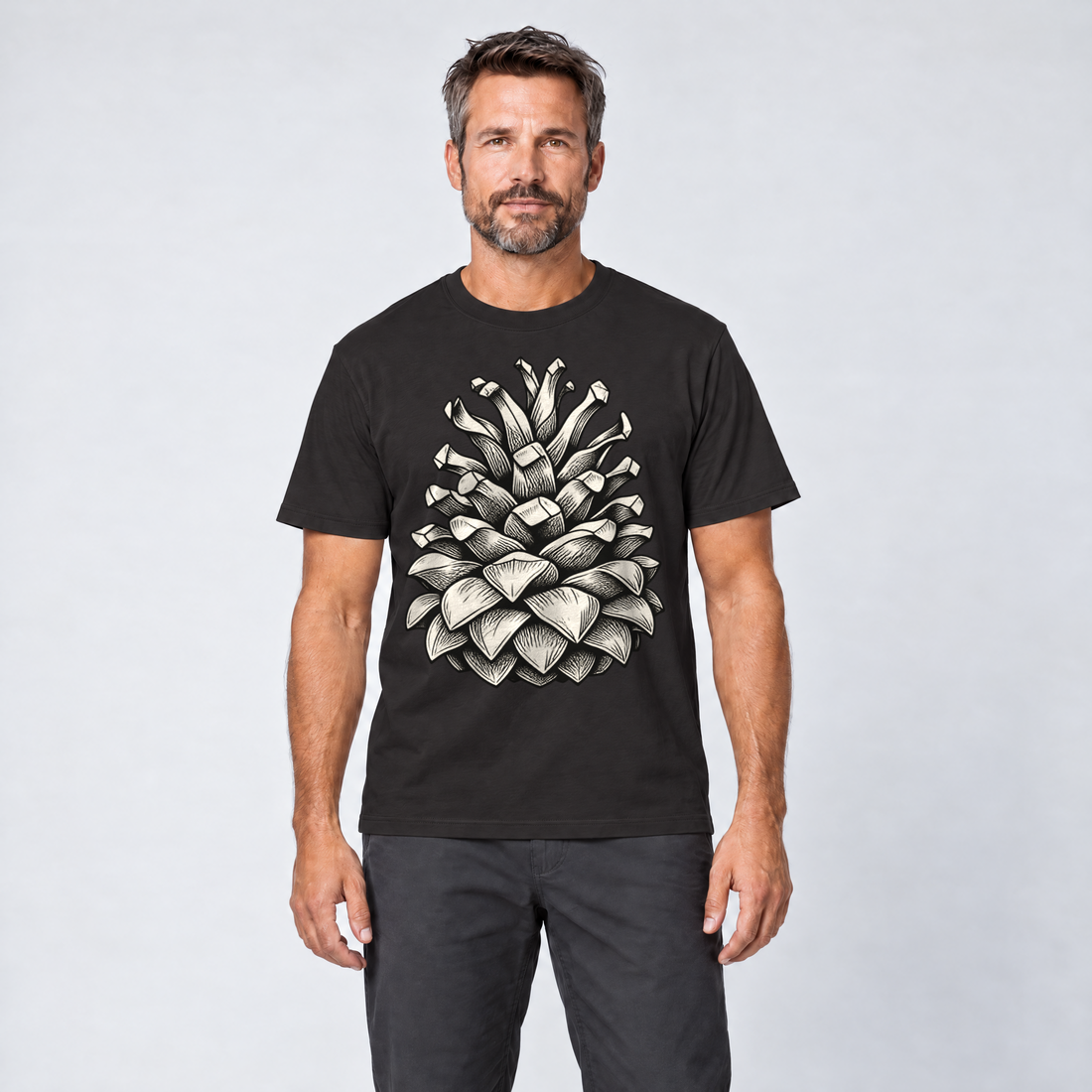 Mann trägt Kiefernzapfen – T-Shirt Unisex in Schwarz, Ansicht von vorn
