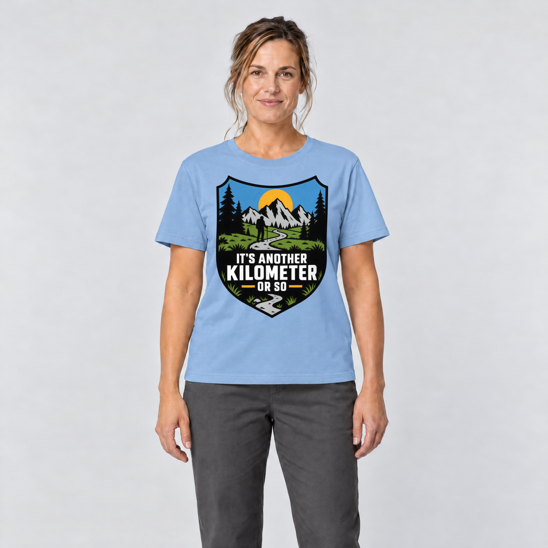 Frau trägt Another Kilometer or So – T-Shirt Unisex in Himmelblau, Ansicht von vorn