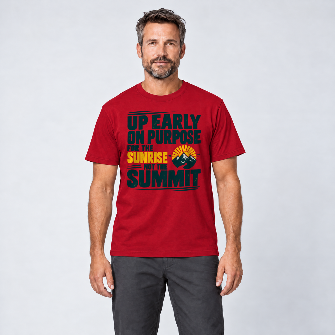 Mann trägt For the Sunrise, Not the Summit – T-Shirt Unisex in Rot, Ansicht von vorn