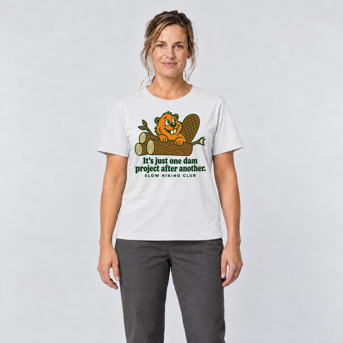 Frau trägt One dam project after another – T-Shirt Unisex in Weiß, Ansicht von vorn