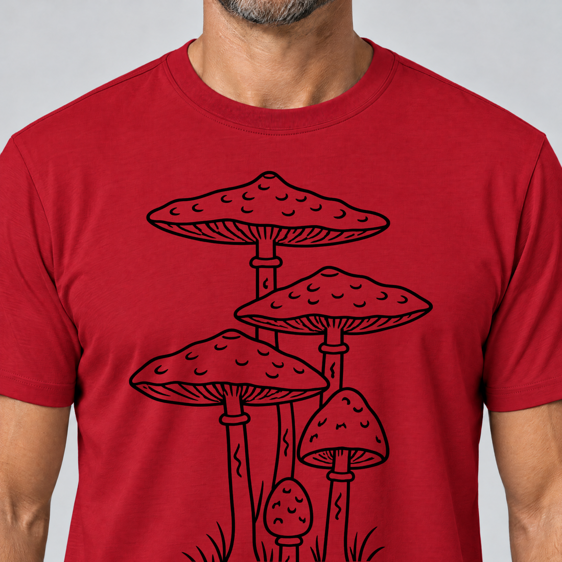 Nahaufnahme des Drucks: Parasolpilze – T-Shirt Unisex in Rot, von einem Mann getragen