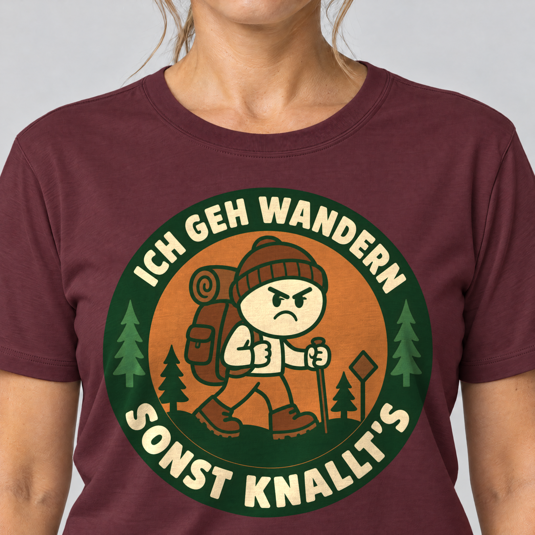 Nahaufnahme des Drucks: Sonst knallt’s – T-Shirt Unisex in Bordeaux, von einer Frau getragen