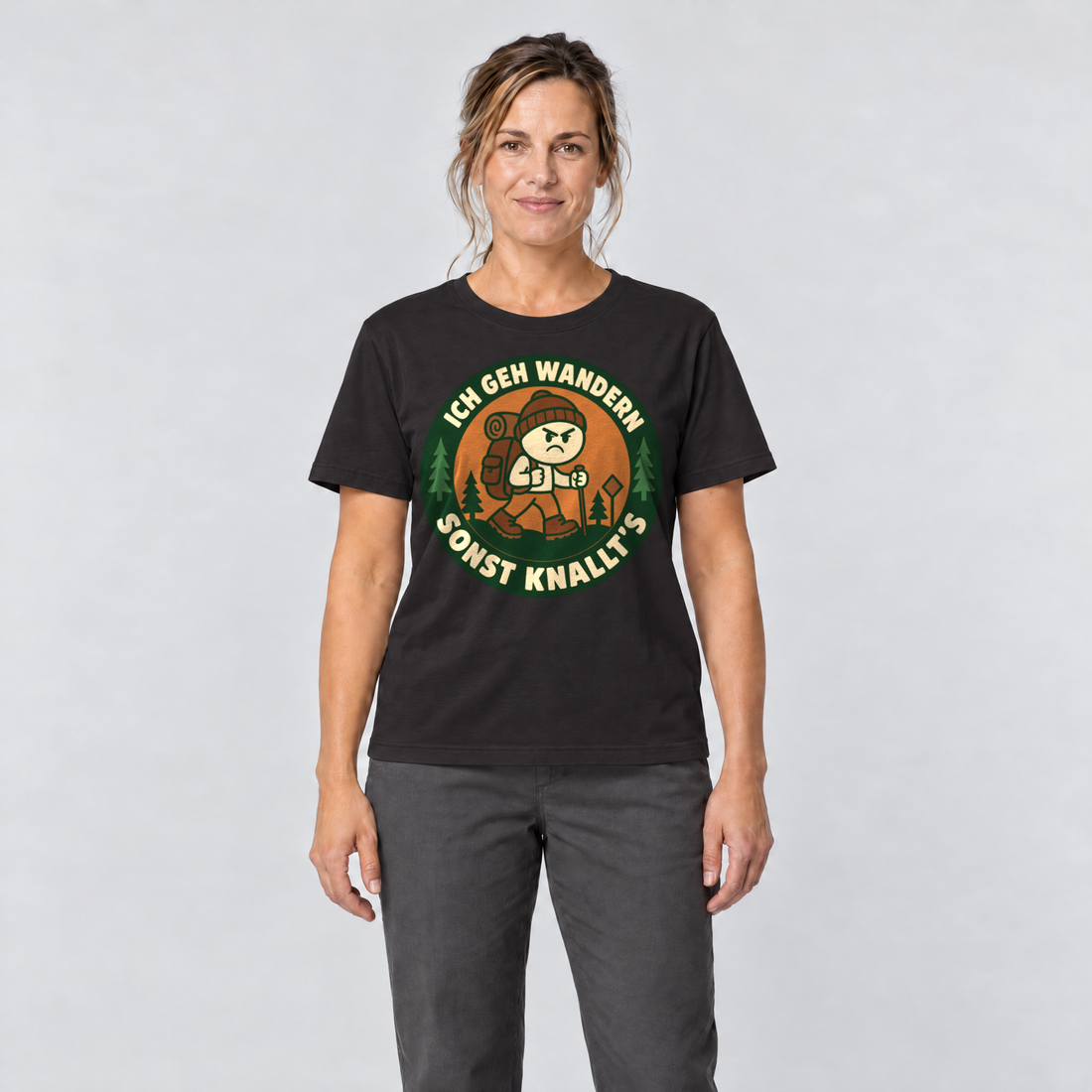 Frau trägt Sonst knallt’s – T-Shirt Unisex in Schwarz, Ansicht von vorn