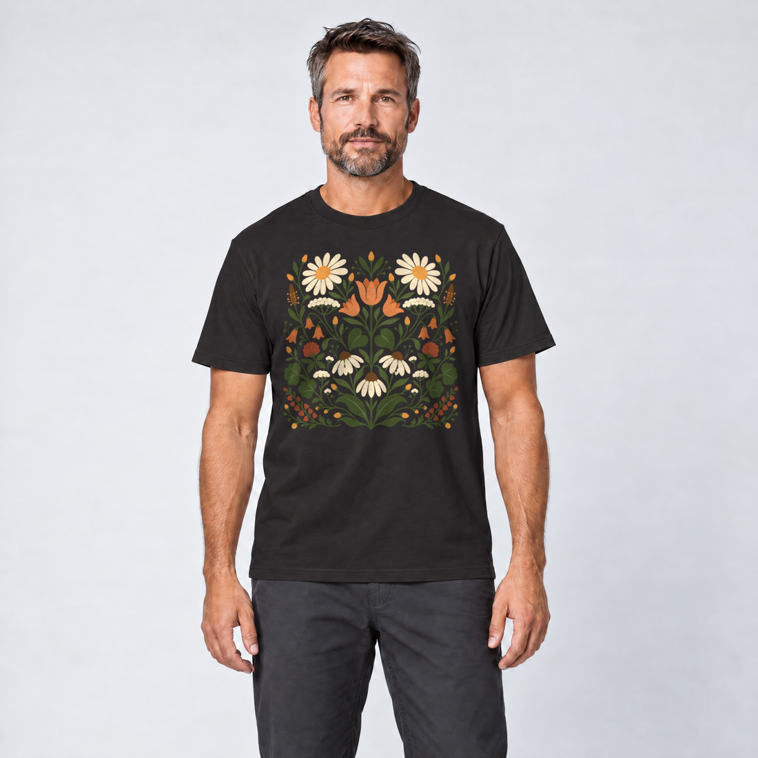 Mann trägt Wiesenblumenstrauß – T-Shirt Unisex in Schwarz, Ansicht von vorn