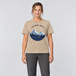 Frau trägt Zeitzone: Hütte – T-Shirt Unisex in Sand, Ansicht von vorn